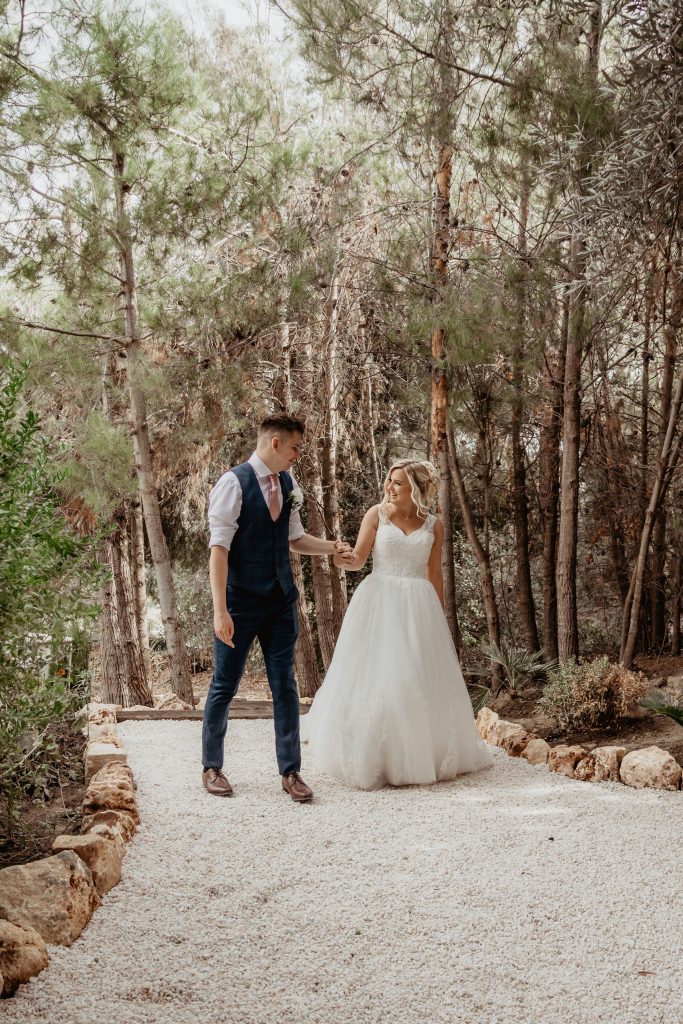 Bride and groom portrait in the garden of Finca Santa Fe.