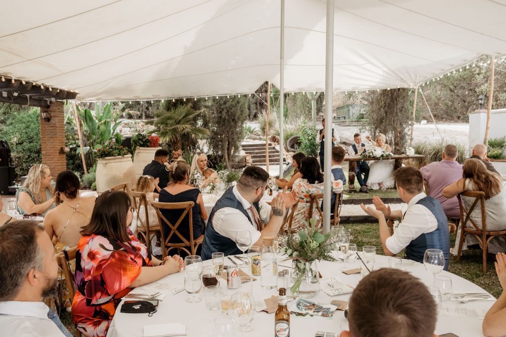 Wedding party celebrating with the bride and groom at Finca Santa Fe.