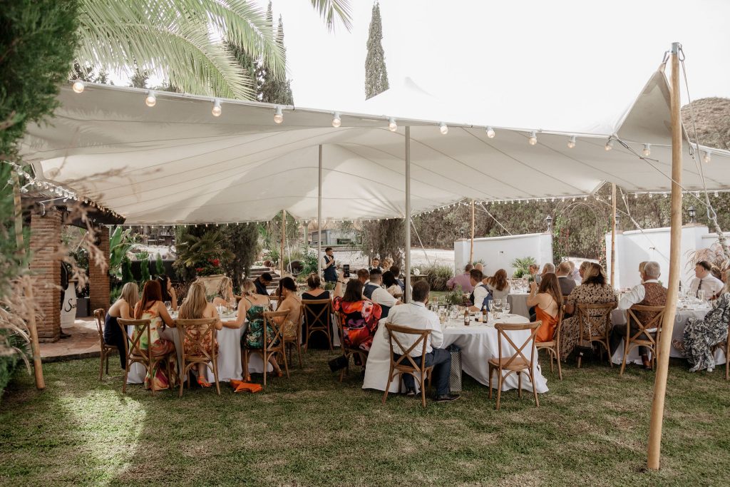 Wedding guests enjoying speeches at Finca Santa Fe.