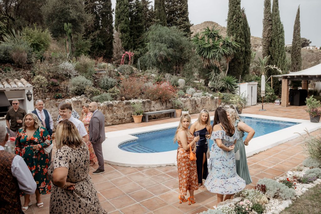 Wedding guests enjoying the wedding reception at Finca Santa Fe.